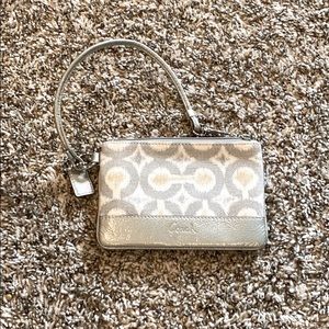 Coach gray and silver signature fabric wristlet